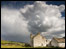 White clouds and farmhouse at Alston taken by Eric Barrett
