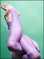 ballet dancers' legs, twisted together