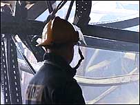 Fire fighter and tangled wreckage