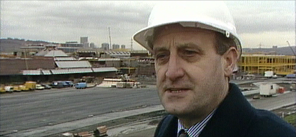 John Hall in front of the Metro Centre under construction in the mid 80's