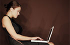 Email links to bereavement organisations (Image: woman using a laptop)