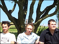 Exit 24 sat under a tree