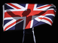A man holding a british flag