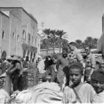 Sergeant Len Scott and friends in an Algerian market, 1943