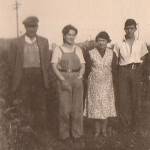 Marie Carruthers on Land Army duty at Childerditch Hall, near Brentwood, Essex, with Mrs Dickens and her sons Podge, left, (real name George) and Doug