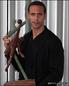 Rio Ferdinand with a model of the Arthur Wharton statue