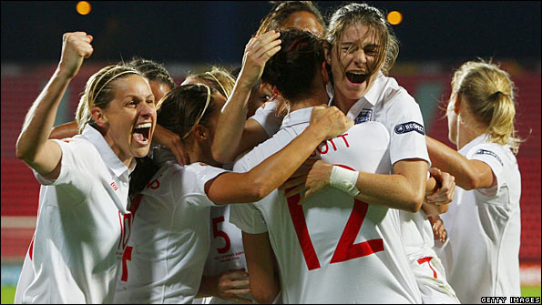 Jill Scott is mobbed by her team-mates after scoring England's winner in the European Championship semi-final