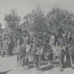 Nagas passing through 'C' Company lines at Maram Rest Camp carrying branches to indicate they come in peace. Taken by CQMS Fred Weedman, 1944