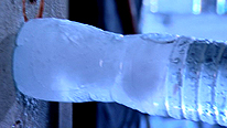 A supercooled bottle of water turns to ice when it is banged against the wall