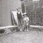 John Warren is the small boy on the right. His brother is standing next to him.