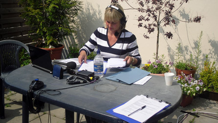 Louise behind the microphone in Germany