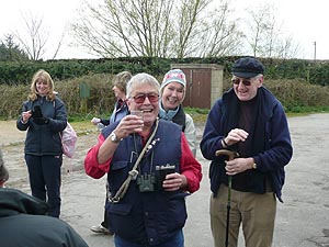 Peter Donaldson, Charlotte Green and Brian Perkins having a drink midway.