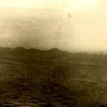 "Snap taken as we were leaving Honolulu Bay. the bay can just be made out at base of mountains in centre."