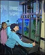 Picture: Two children exploring the Origins visitor centre.