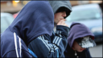 Young men in hooded tops