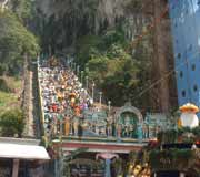 Pilgrims flock up the steps into the Batu Caves