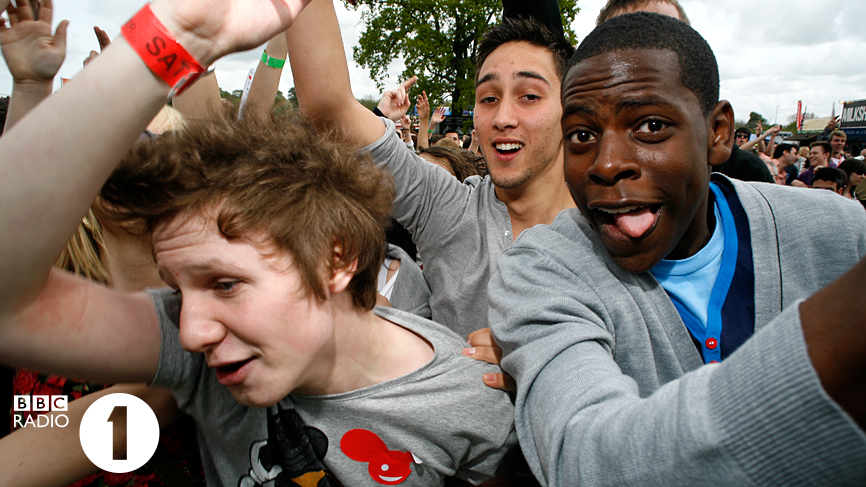 The crowd rush to the Outdoor stage