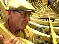 Paul Evans amongst the beams of a Basque whale boat.