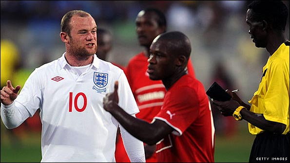 Rooney is booked for dissent against Platinum Stars