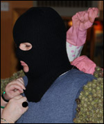 The Burryman getting dressed for the occasion.
