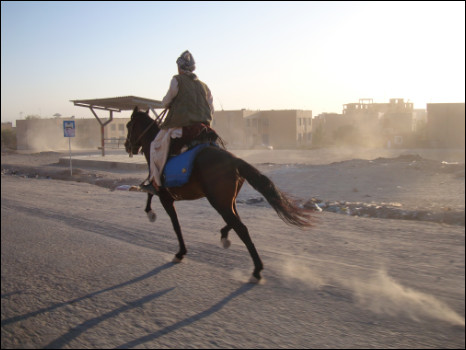 A man riding a horse in Afghanistan