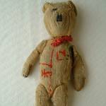 Very worn out teddy which went around 5 children in 2 families.