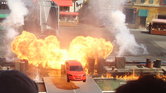 Car through flame...