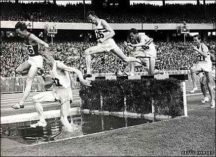 Chris Brasher (centre) in the 3,000m steeplechase