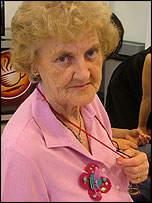 Angela wearing the broach she made