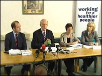 Michael McGimpsey with key health officials and doctors