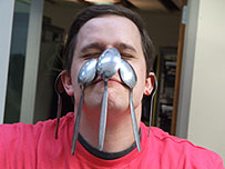 Ed with spoons on his face