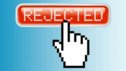 A mouse cursor hovering over an online 'rejected' button