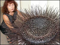 Barbara Leaney with dogwood sculpture