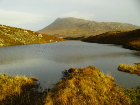 Eaval in distance, above loch.