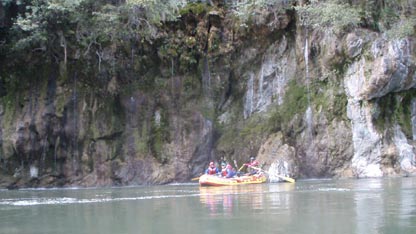 The crew cruising down the river