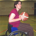 Kate Ansell looks apprehensive as she tries wheelchair basketball for the first time