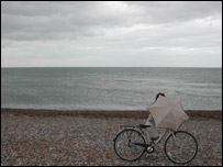 A beach in England with a cloudy sky