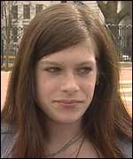 Passerby looking at the statue