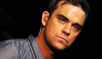 Robbie Williams performs at BBC Electric Proms 2009