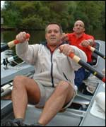 Charlie (at the rear) and Pete rowing