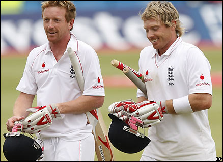 Paul Collingwood and Ian Bell leave the field after seeing England to victory