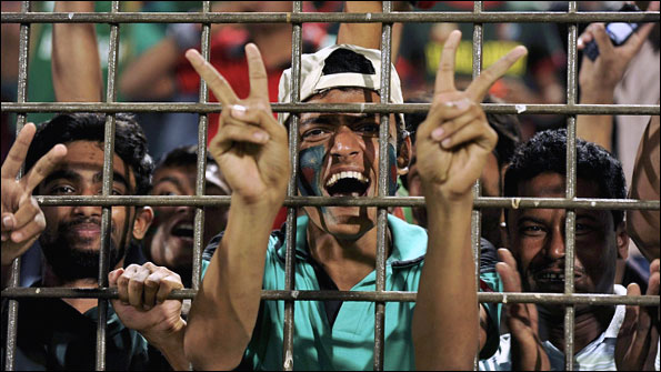 Bangladesh fans celebrate their teams victory over England.