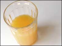 Copo de suco de laranja