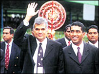 Minister Johnston Fernando (r) with UNP leader Ranil Wickramasinghe (file photo)