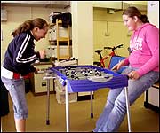 Enjoying a game of table football