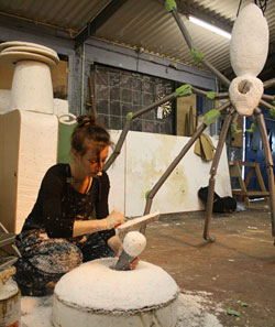 An artist building the enormous spider