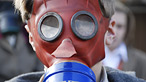 Child in a gas mask