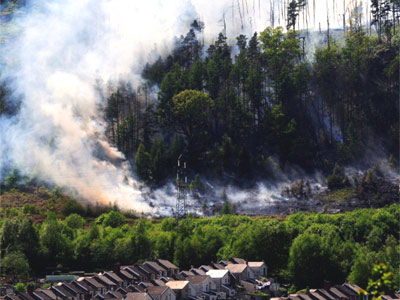 Retired firefighter, Gerwyn Gibbs took this amazing photo of a forest fire from his garden in Mountain Ash yesterday.