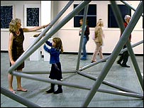 Visitors explore Nick Ball's decahedron