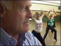 John Cushing watches the audition for dancers